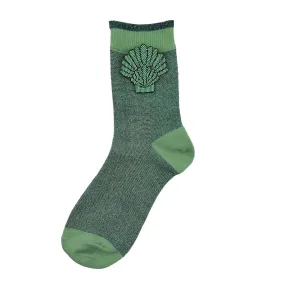 Tokyo socks in mint with a mint shell brooch