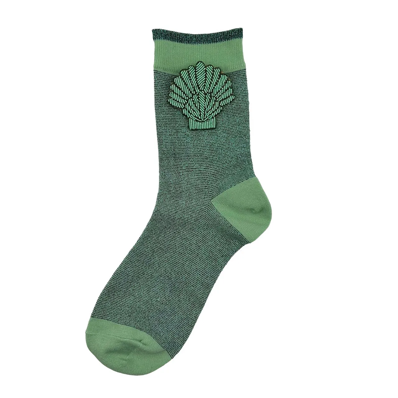 Tokyo socks in mint with a mint shell brooch